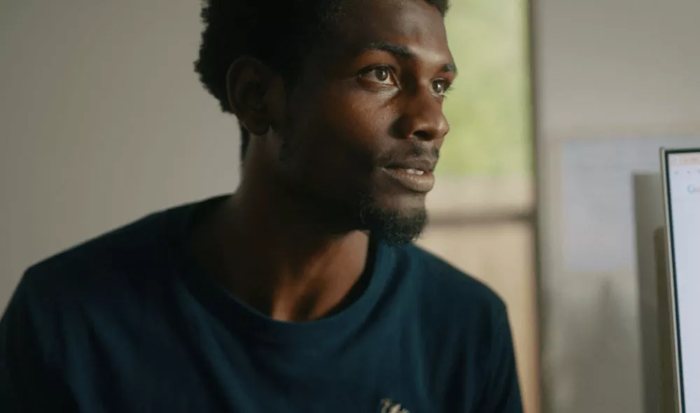 Javon, a young black man wearing a dark colored shirt